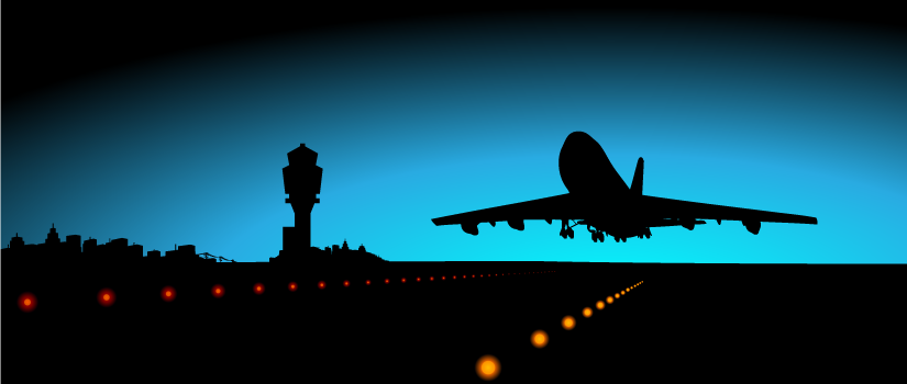 显示在夜间在机场起飞的飞机的剪影的图象。